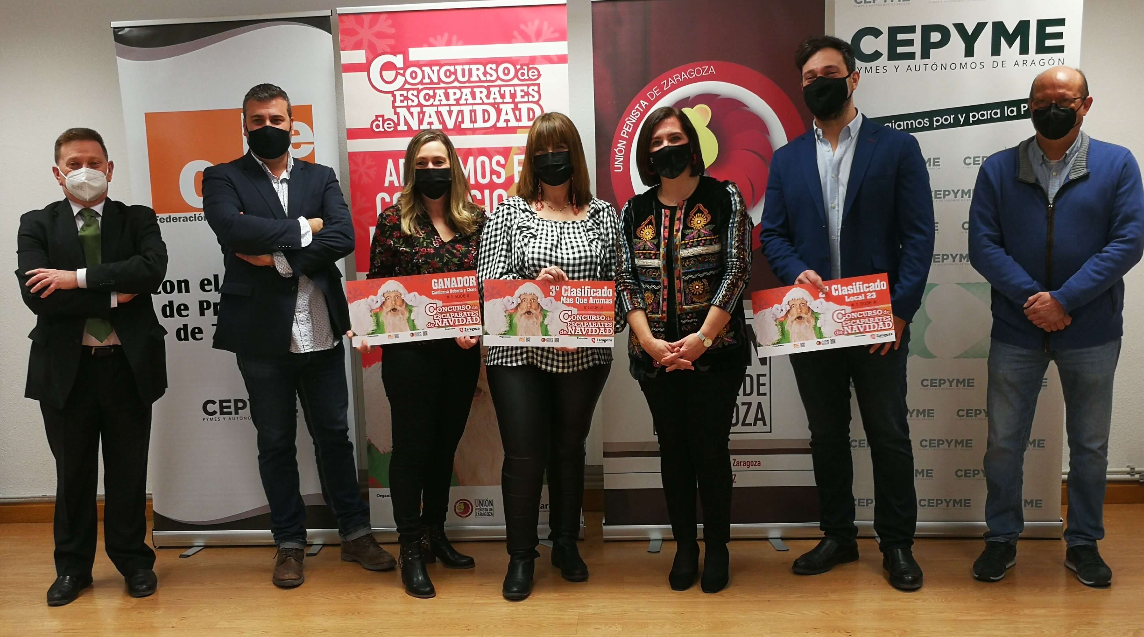 Carnicería Charo y Roberto, Local 23 y Más que aromas se alzan con los premios del Concurso de escaparates navideños organizado por FECOM